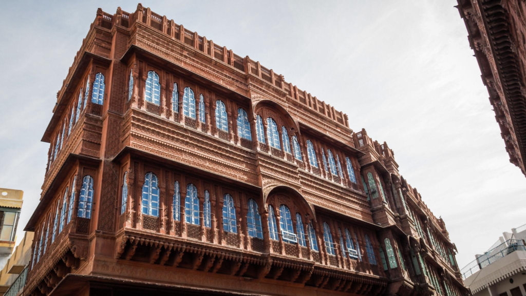 Traditional Bikaner heritage building with intricate red sandstone architecture